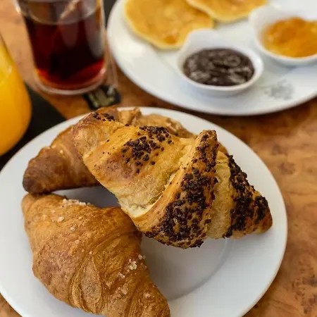 Button מלון פארמה